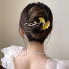 Kopida Ginkgo Leaf Twist Clip hair claw clip worn on model – styled for women