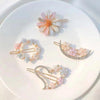Bella Floral Hairclips hair clip shown with Fix My Hairs gift packaging