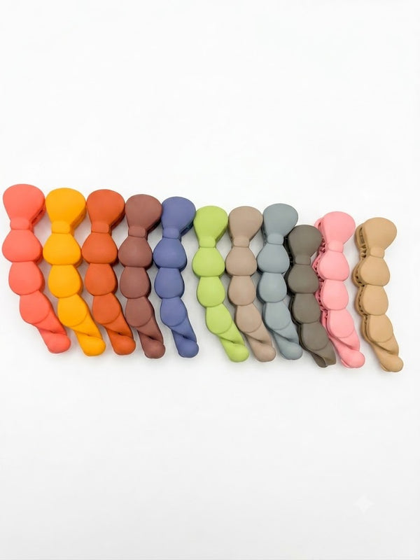Close-up of the Bow Banana Matte Hair Clip showing bow detail