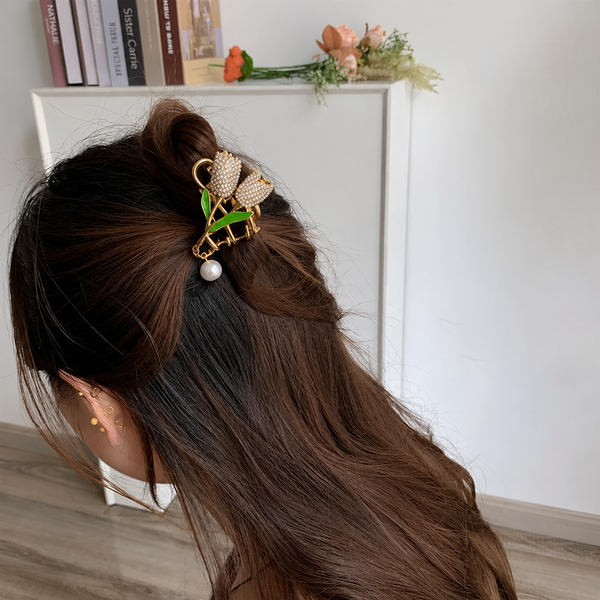 Close-up of the Studded Tulip Pearl Hair Clip showing tulip motif