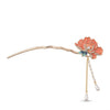 Close-up of the Peony Studded Hair Stick showing stud setting