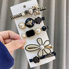 Midnight Blossom & Honey Hair Pins hair clip worn on model – styled for women