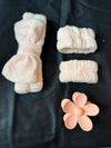 Close-up detail of the Pink Plush Skincare Set hair accessory