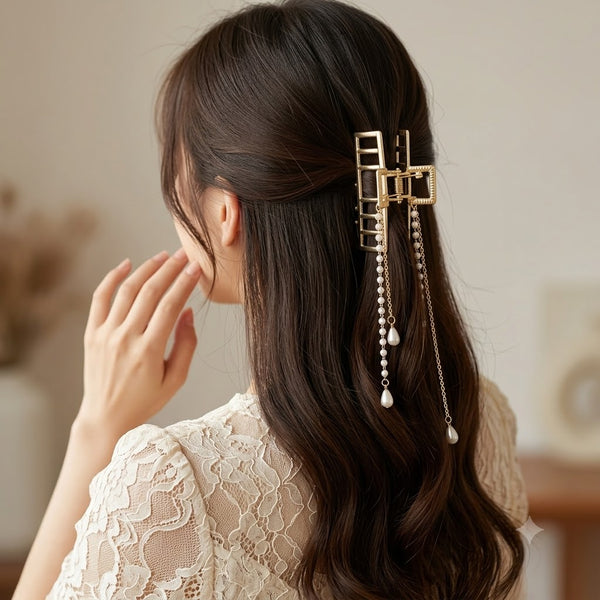 Close-up of the Pearl Chimes Minimal Hair Claw showing pearl detail