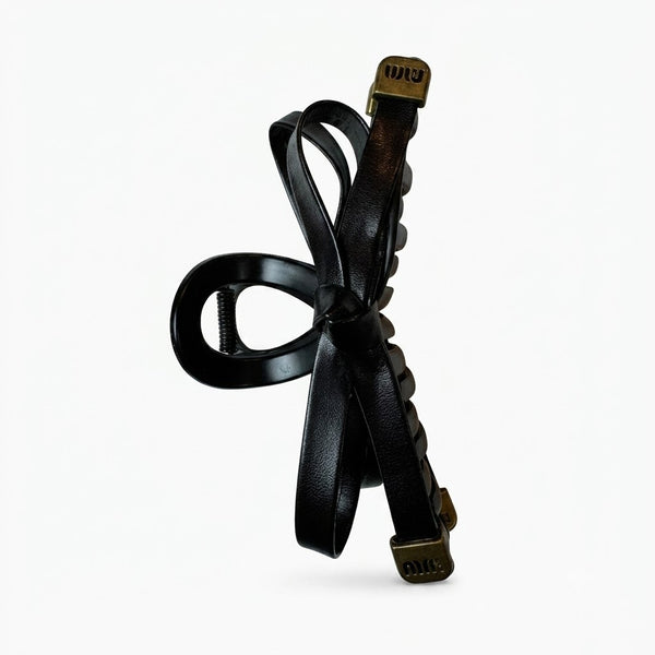 Leather Bow Miu Hair Claw hair claw clip worn on model – styled for women