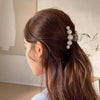 Close-up of the Bubble Pearl Hair Claw showing pearl detail