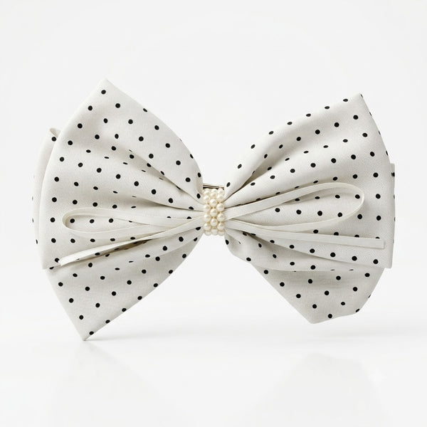 Close-up of the Polka Dot Hair Bow Clip showing bow detail