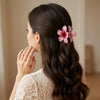 Pink Plumeria Flower Hair Clip hair claw clip – alternate angle