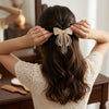 Dreamy Studded Butterfly Tassel Hair Bow Clip – full product view on plain background