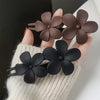 Matte Double Flower Hair Clips hair claw clip worn on model – styled for women