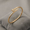 Gold Nail Curve Bracelet