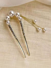 Close-up of the Gold U-Shaped Pearl Hair Fork with Tassel Chains showing chain links