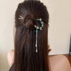 Bamboo-inspired Dangling Bead Hair Pin hair clip worn on model – styled for women