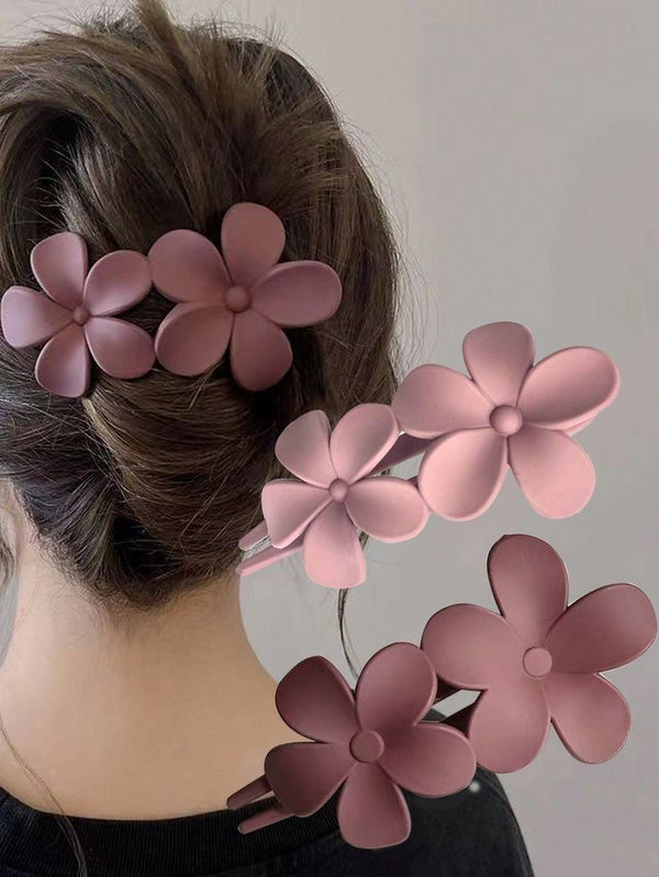Close-up of the Matte Double Flower Hair Clips showing floral motif
