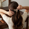 Rhinestone Tassel Leaf Hair Claw hair claw clip worn on model – styled for women