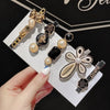Close-up detail of the Midnight Blossom & Honey Hair Pins hair clip