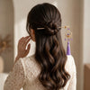 Close-up detail of the Lotus Lantern Purple Tassel Hairpin hair clip