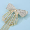 Dreamy Studded Butterfly Tassel Hair Bow Clip shown with Fix My Hairs gift packaging
