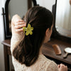 Close-up detail of the Matte Lily Claw Clip hair claw clip