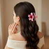 Close-up of the Pink Plumeria Flower Hair Clip showing floral motif